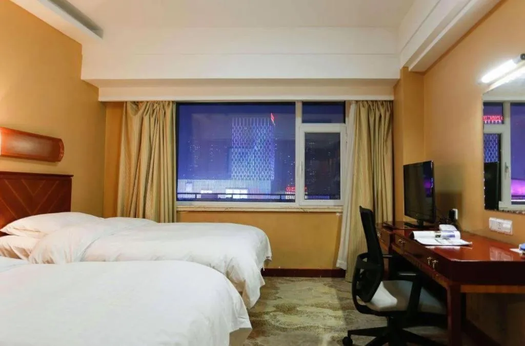 Bed in Yantai Bihai Hotel