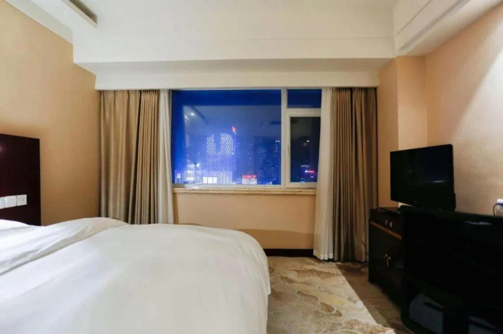 Bed in Yantai Bihai Hotel