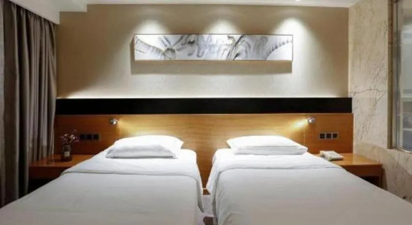 Bed in Yantai Bihai Hotel