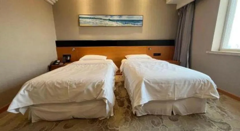 Bed in Yantai Bihai Hotel
