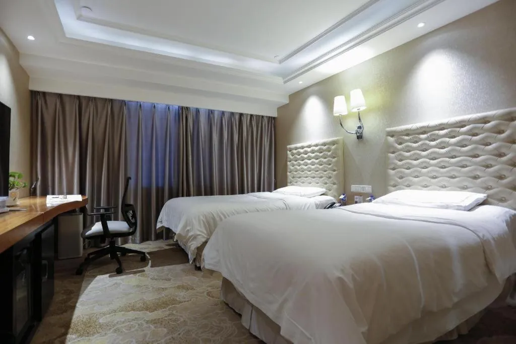 Bed in Yantai Bihai Hotel