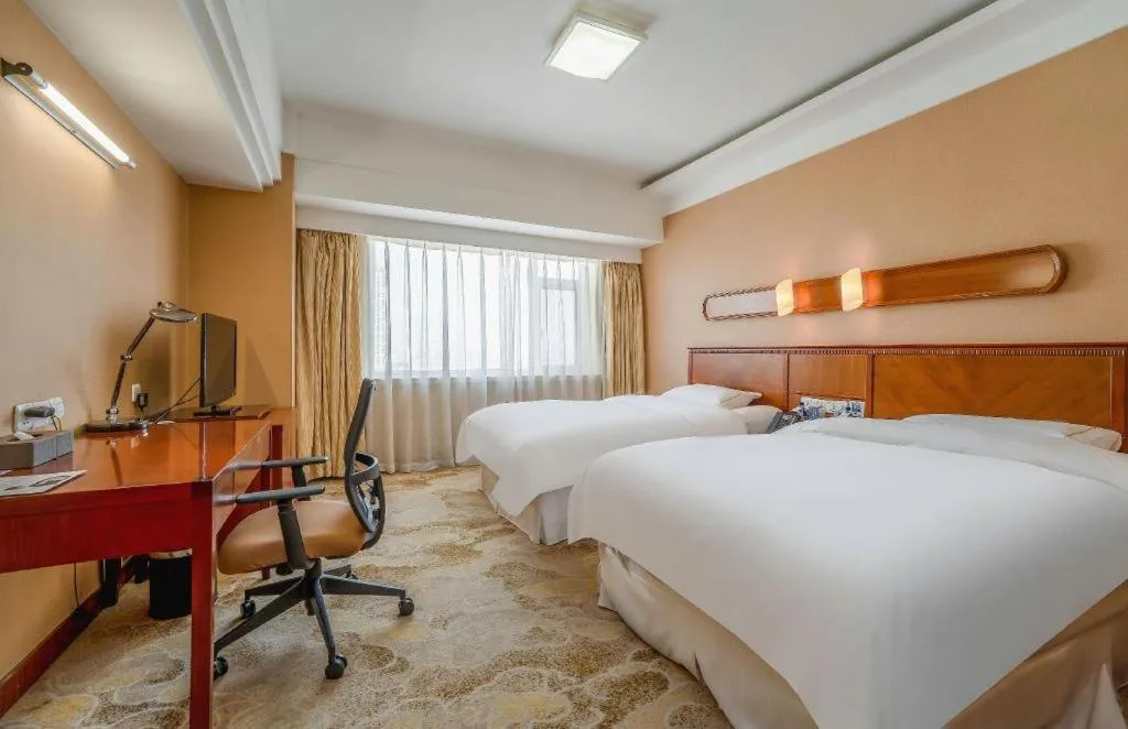 Bed in Yantai Bihai Hotel