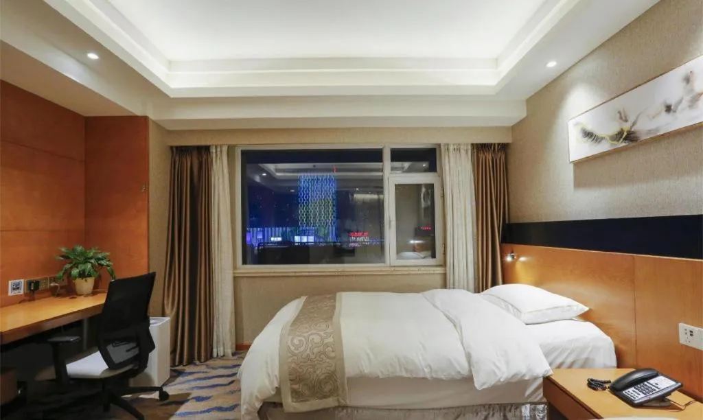 Bed in Yantai Bihai Hotel