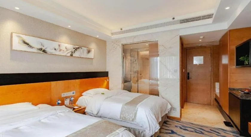 Bed in Yantai Bihai Hotel