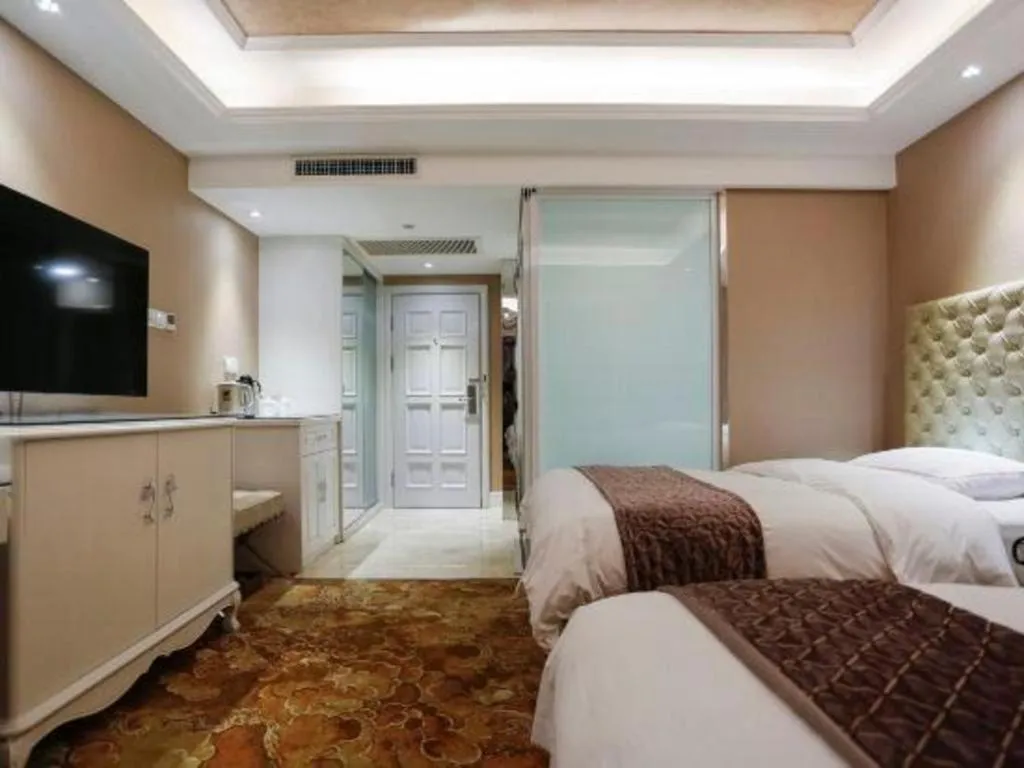 Bed in Yantai Bihai Hotel