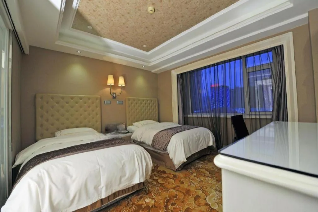 Bed in Yantai Bihai Hotel