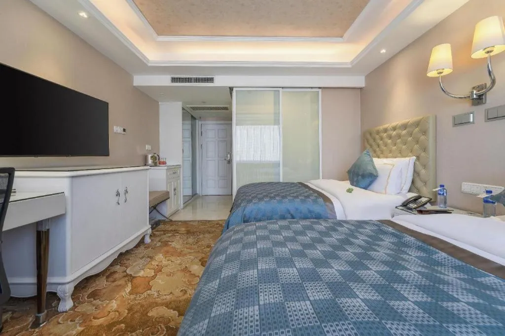 Bed in Yantai Bihai Hotel