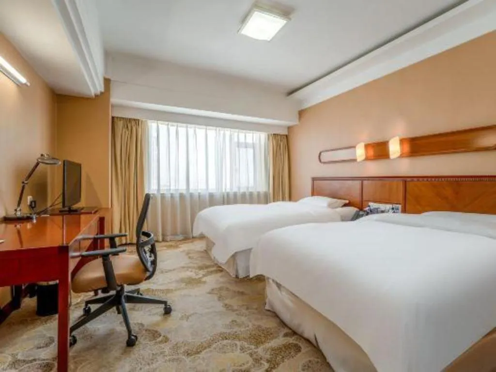 Bed in Yantai Bihai Hotel