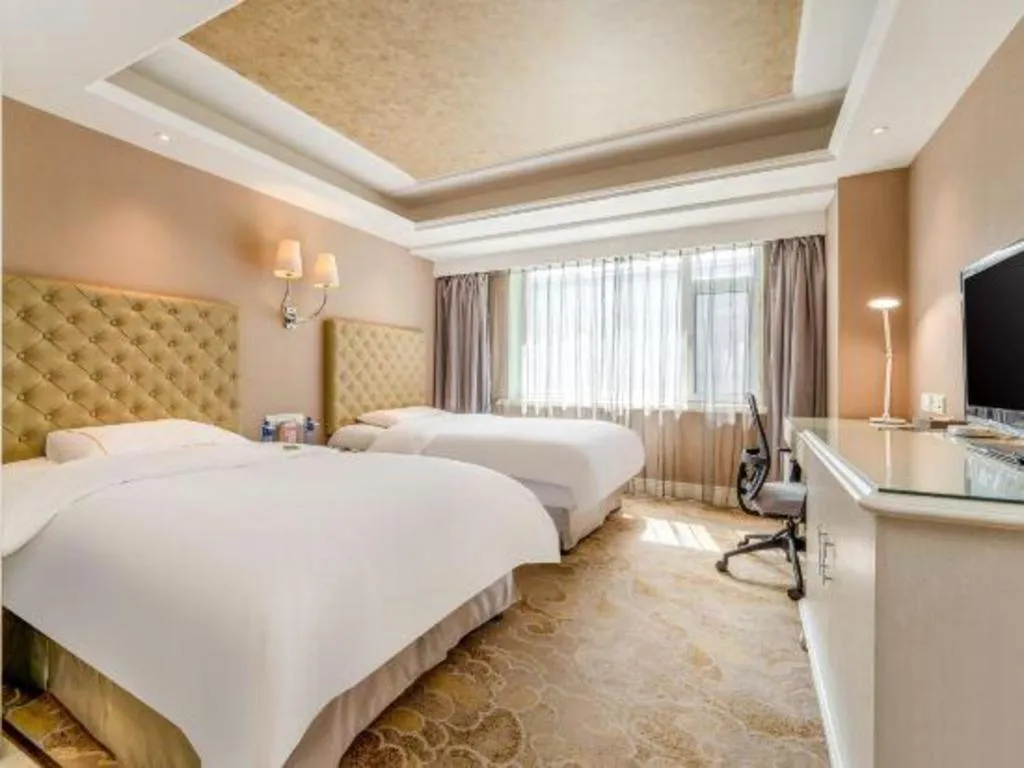 Bed in Yantai Bihai Hotel