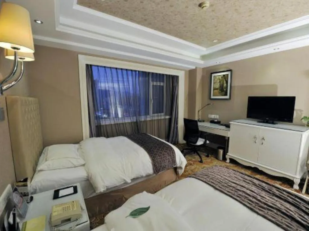 Bed in Yantai Bihai Hotel