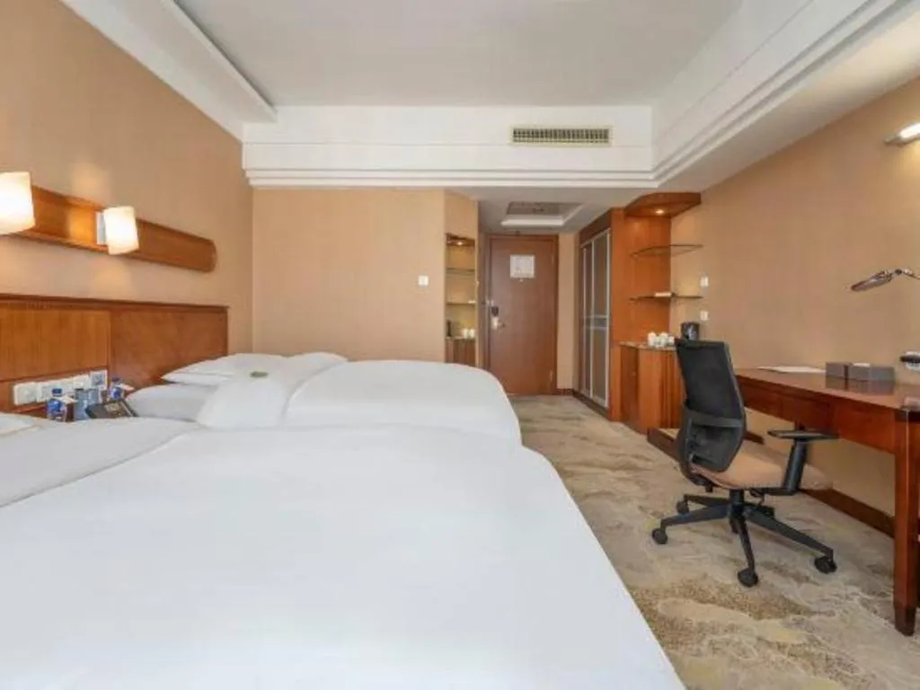 Bed in Yantai Bihai Hotel