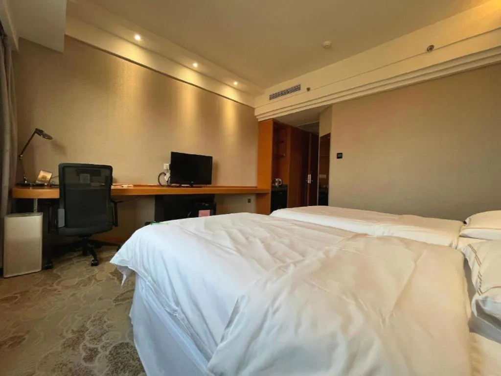 Bed in Yantai Bihai Hotel