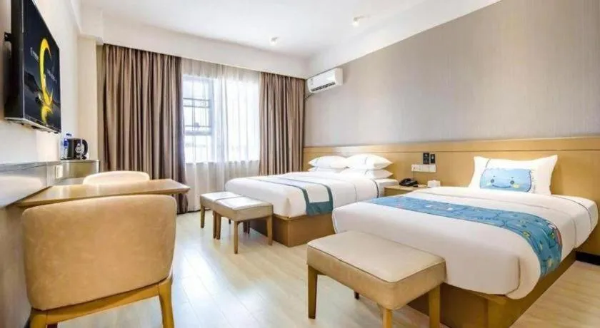 Bed in City Comfort Inn Liuzhou Liunan Wanda Plaza
