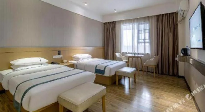 Bed in City Comfort Inn Liuzhou Liunan Wanda Plaza