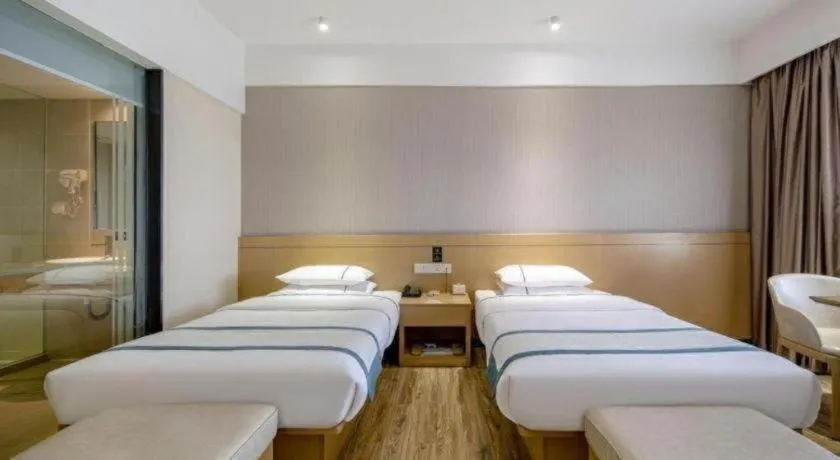 Bed in City Comfort Inn Liuzhou Liunan Wanda Plaza