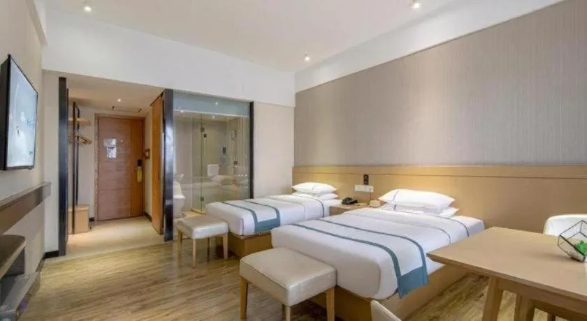 Bed in City Comfort Inn Liuzhou Liunan Wanda Plaza