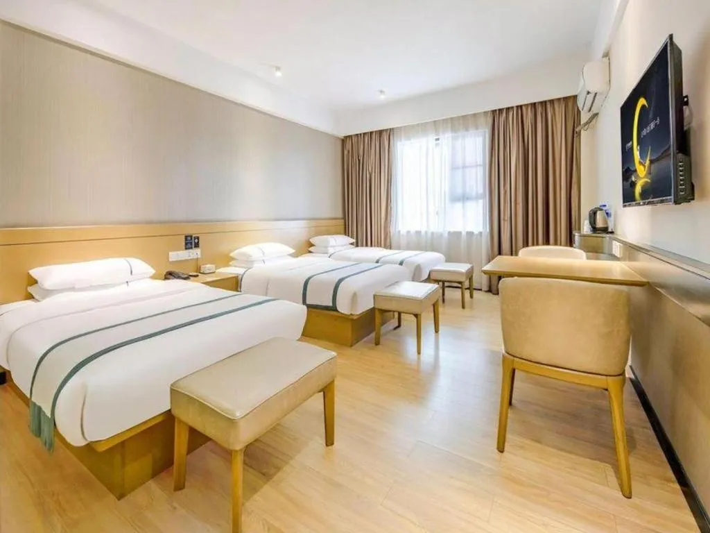 Bed in City Comfort Inn Liuzhou Liunan Wanda Plaza