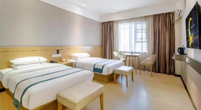 Bed in City Comfort Inn Liuzhou Liunan Wanda Plaza