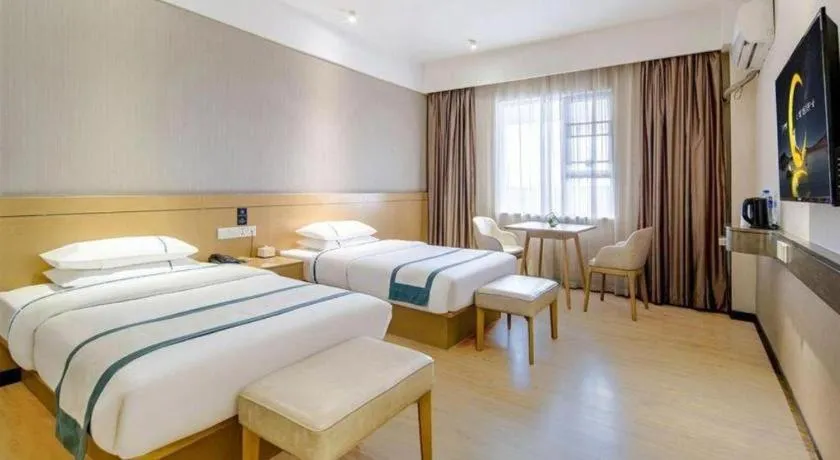 Bed in City Comfort Inn Liuzhou Liunan Wanda Plaza