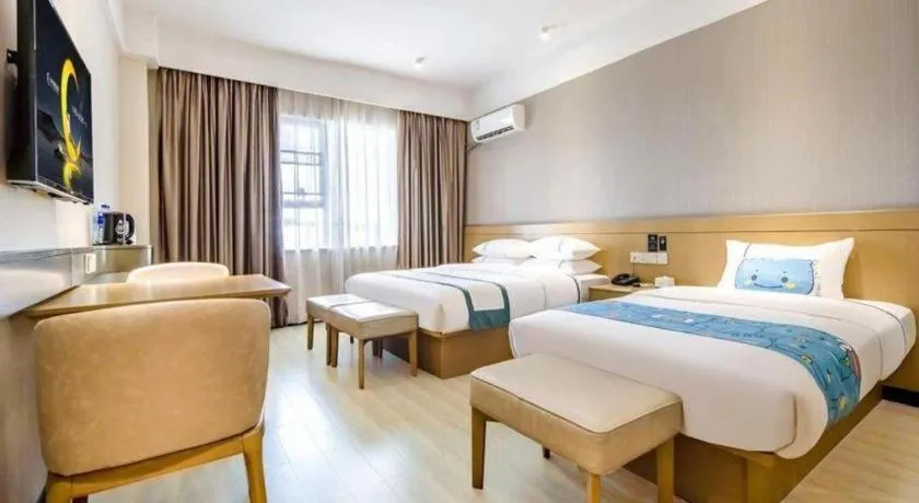 Bed in City Comfort Inn Liuzhou Liunan Wanda Plaza
