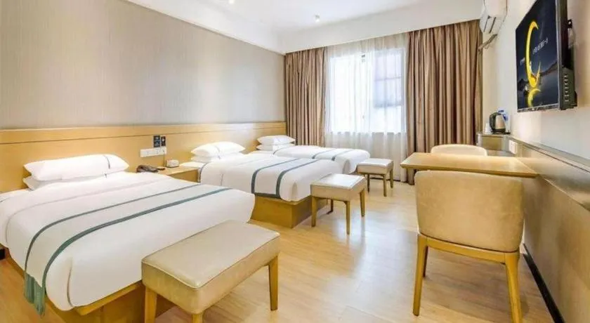 Bed in City Comfort Inn Liuzhou Liunan Wanda Plaza