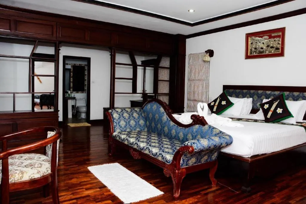 Bed in Anoulack Khen Lao Hotel