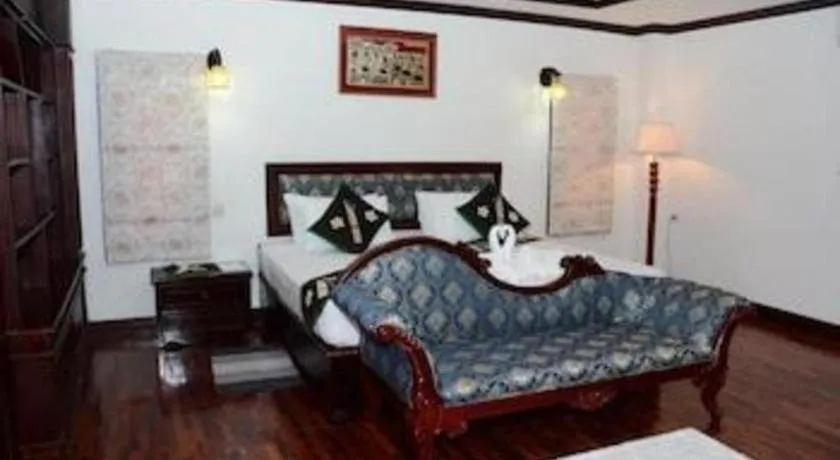 Bed in Anoulack Khen Lao Hotel