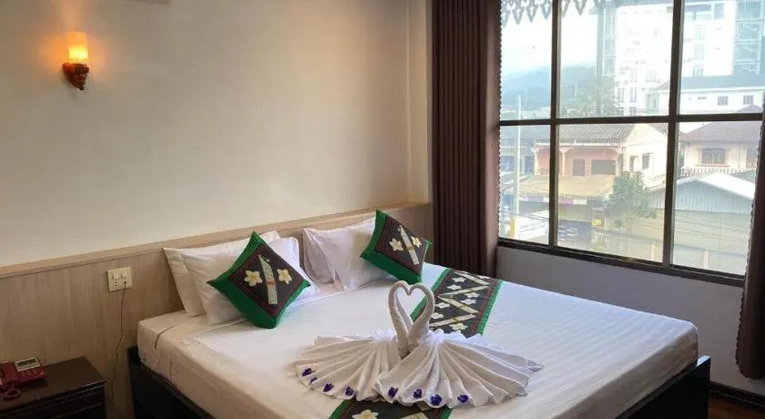 Bed in Anoulack Khen Lao Hotel