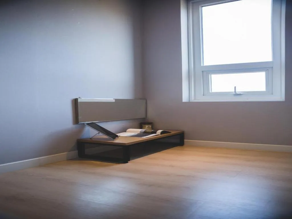 Bed in Sallys Jeju Hotel