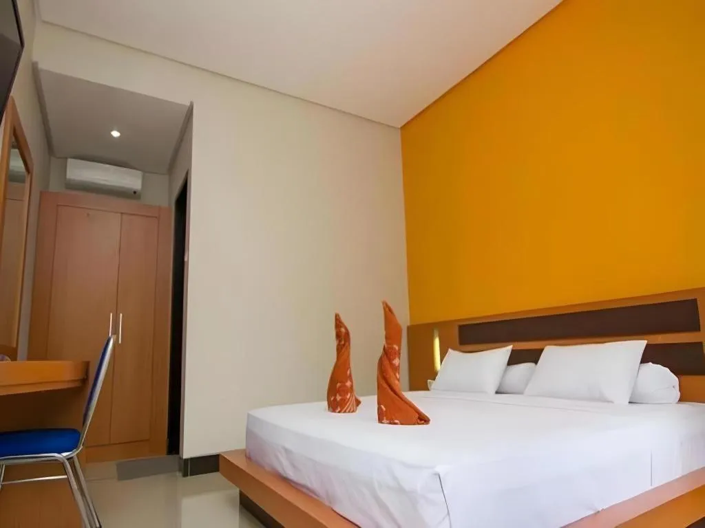 Bed in Hotel New Melati