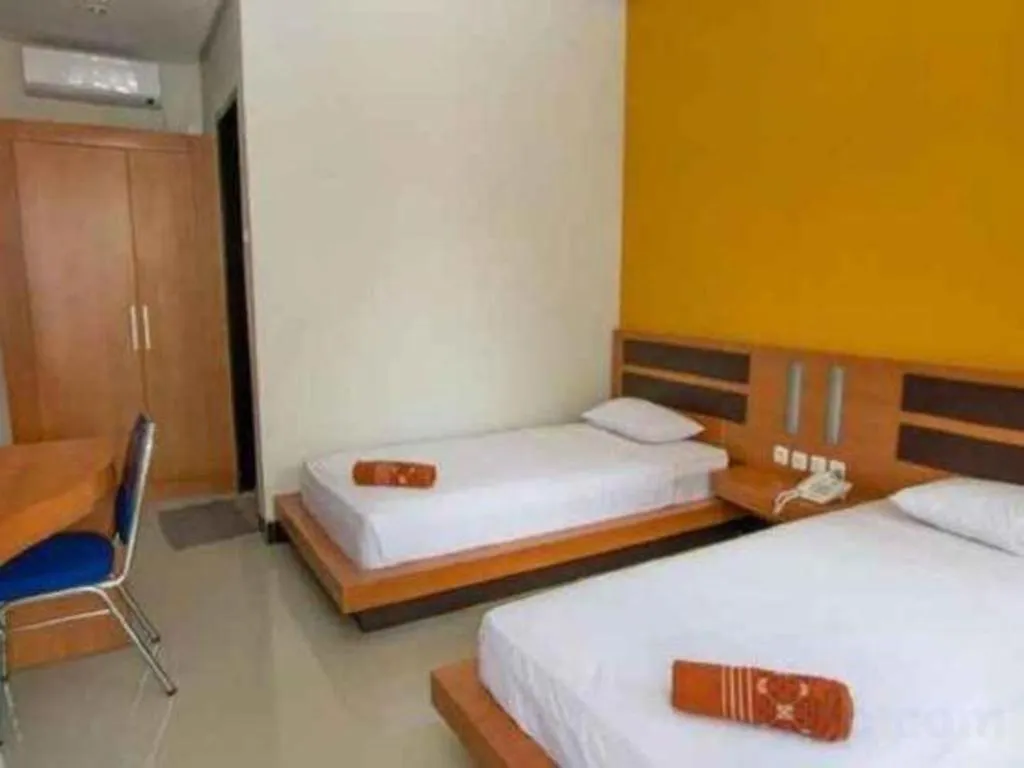 Bed in Hotel New Melati