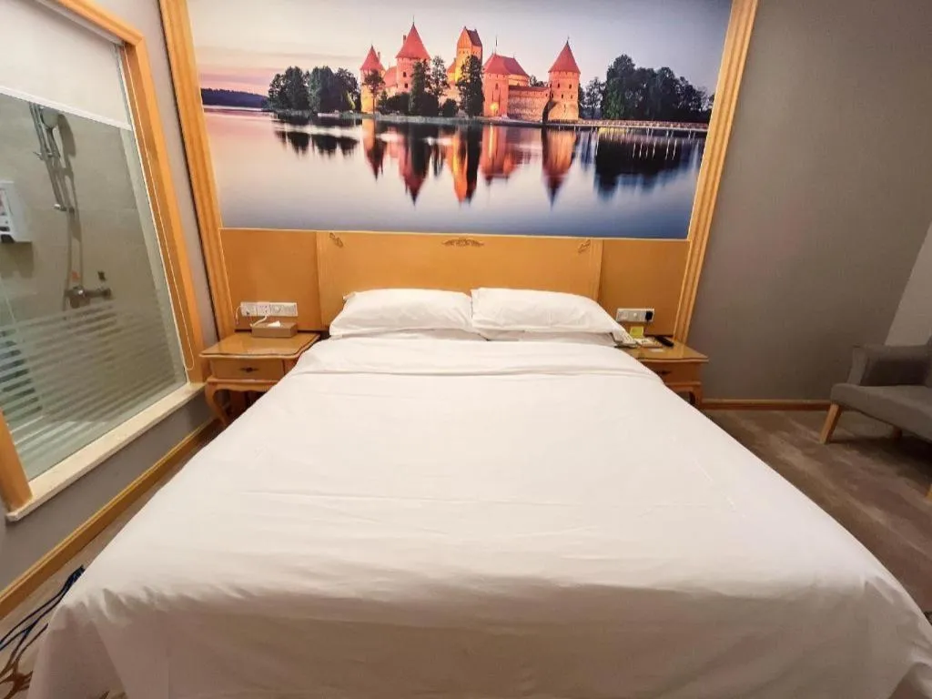 Bed in Vienna Hotel Shenzhen Longgang Dayun Center Branch
