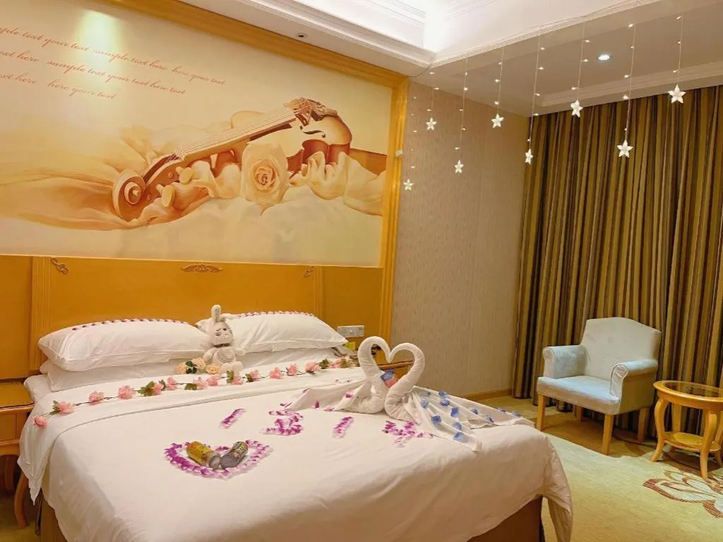 Bed in Vienna Hotel Shenzhen Longgang Dayun Center Branch