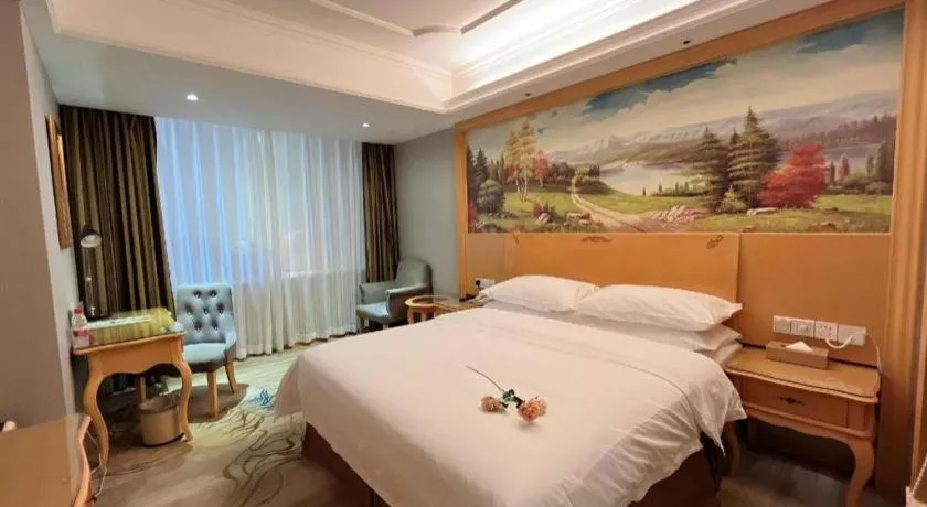 Bed in Vienna Hotel Shenzhen Longgang Dayun Center Branch