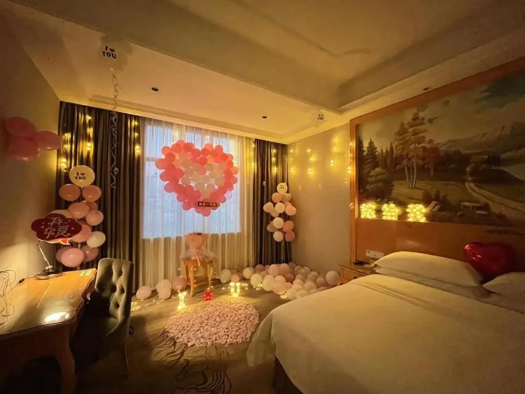 Bed in Vienna Hotel Shenzhen Longgang Dayun Center Branch
