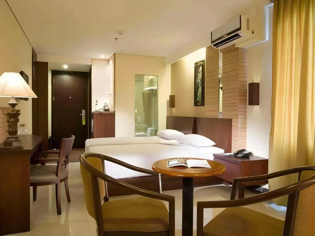 Bed in Losari Roxy Hotel Jakarta