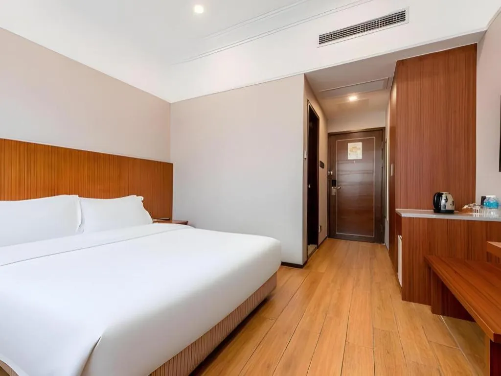 Bed in Carrianna Hotel