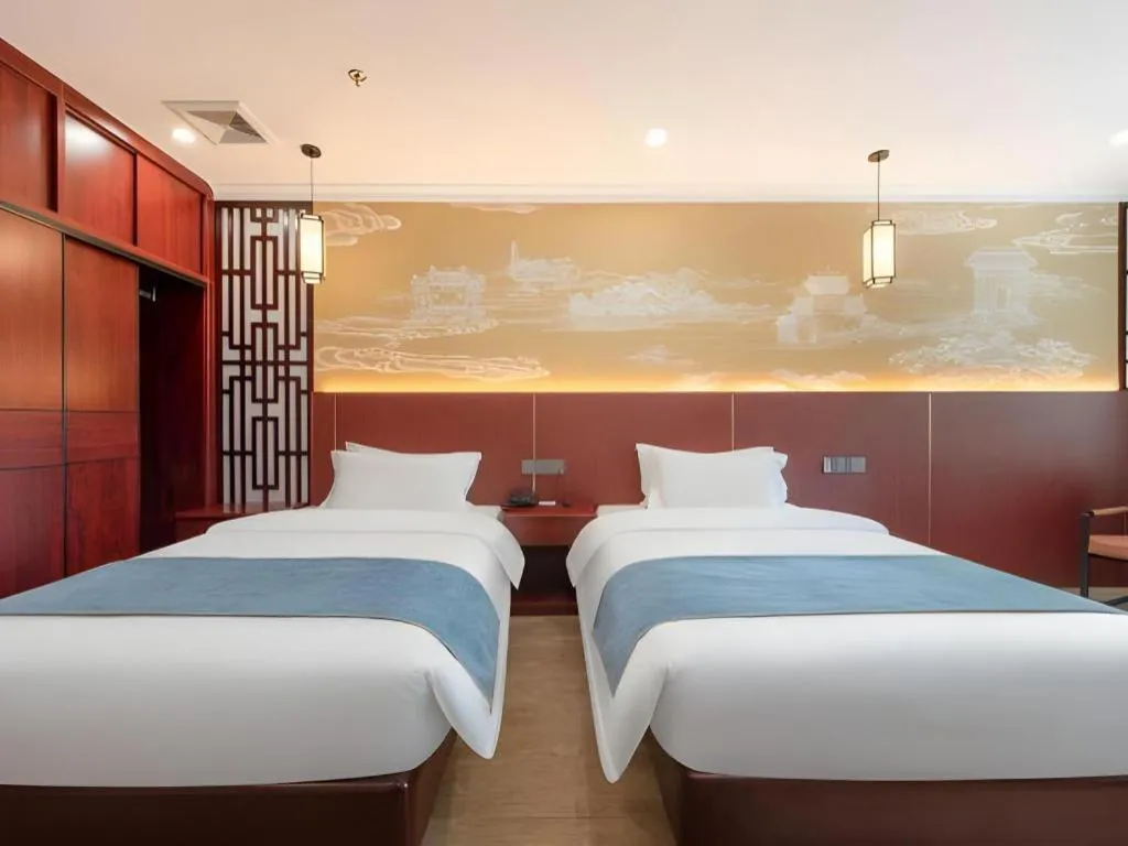 Bed in Carrianna Hotel