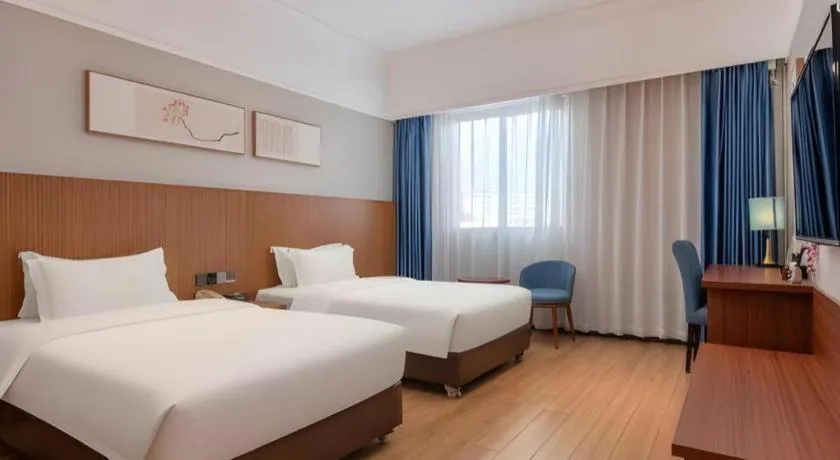 Bed in Carrianna Hotel