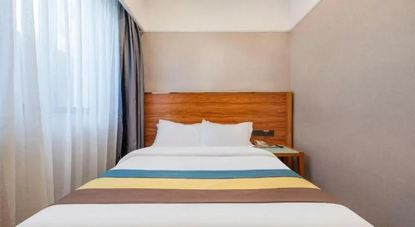 Bed in Carrianna Hotel