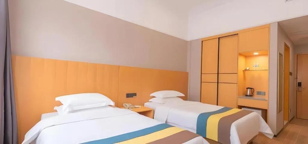 Bed in Carrianna Hotel