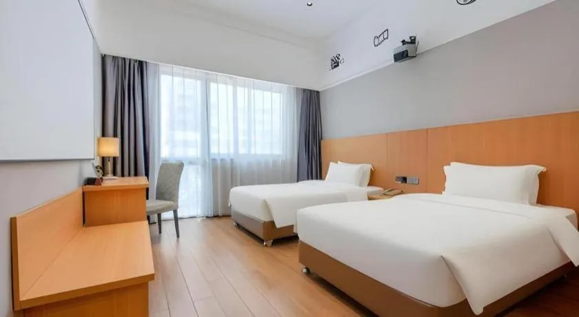 Bed in Carrianna Hotel