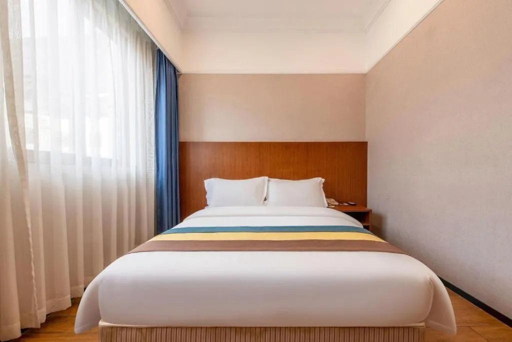 Bed in Carrianna Hotel