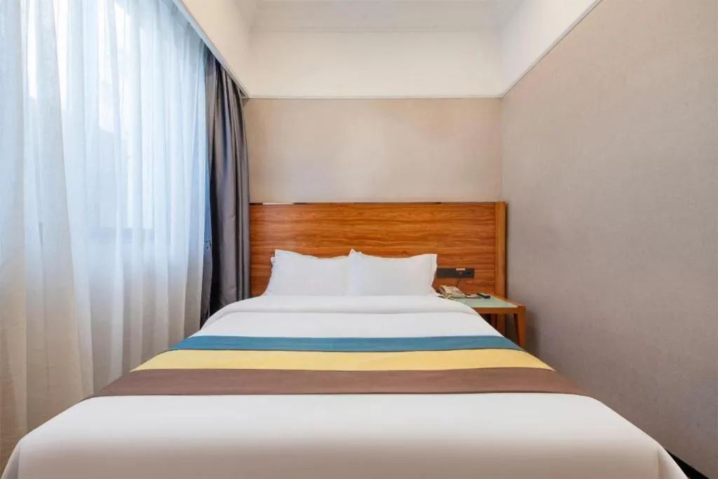 Bed in Carrianna Hotel