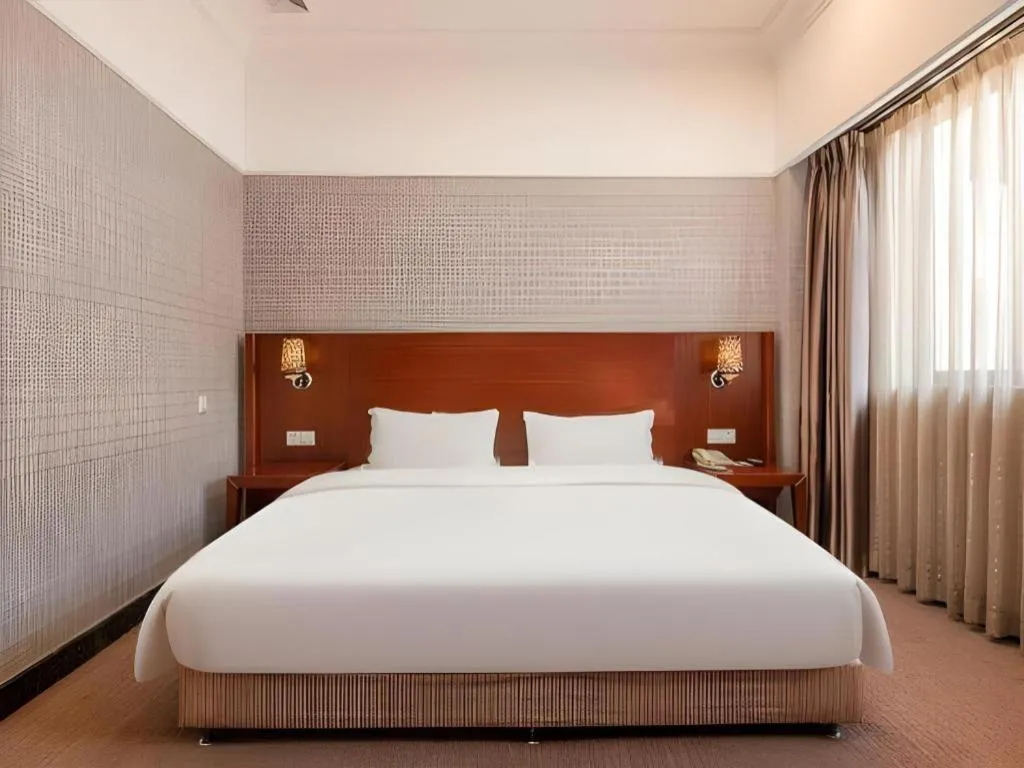 Bed in Carrianna Hotel