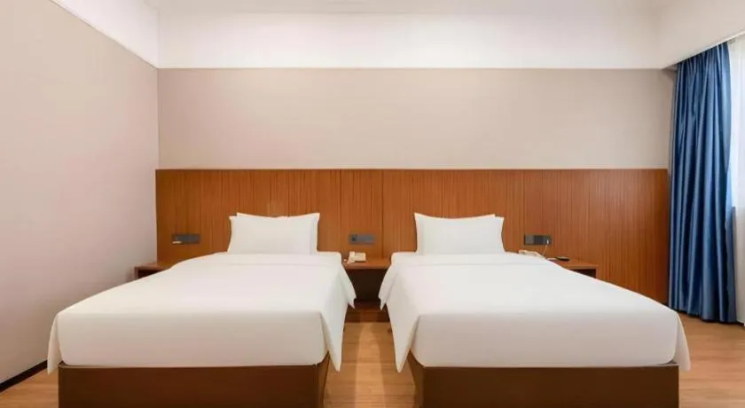 Bed in Carrianna Hotel