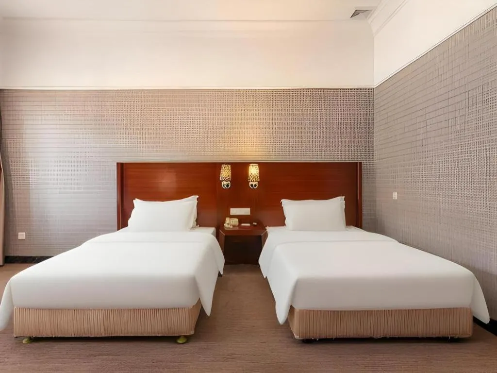 Bed in Carrianna Hotel