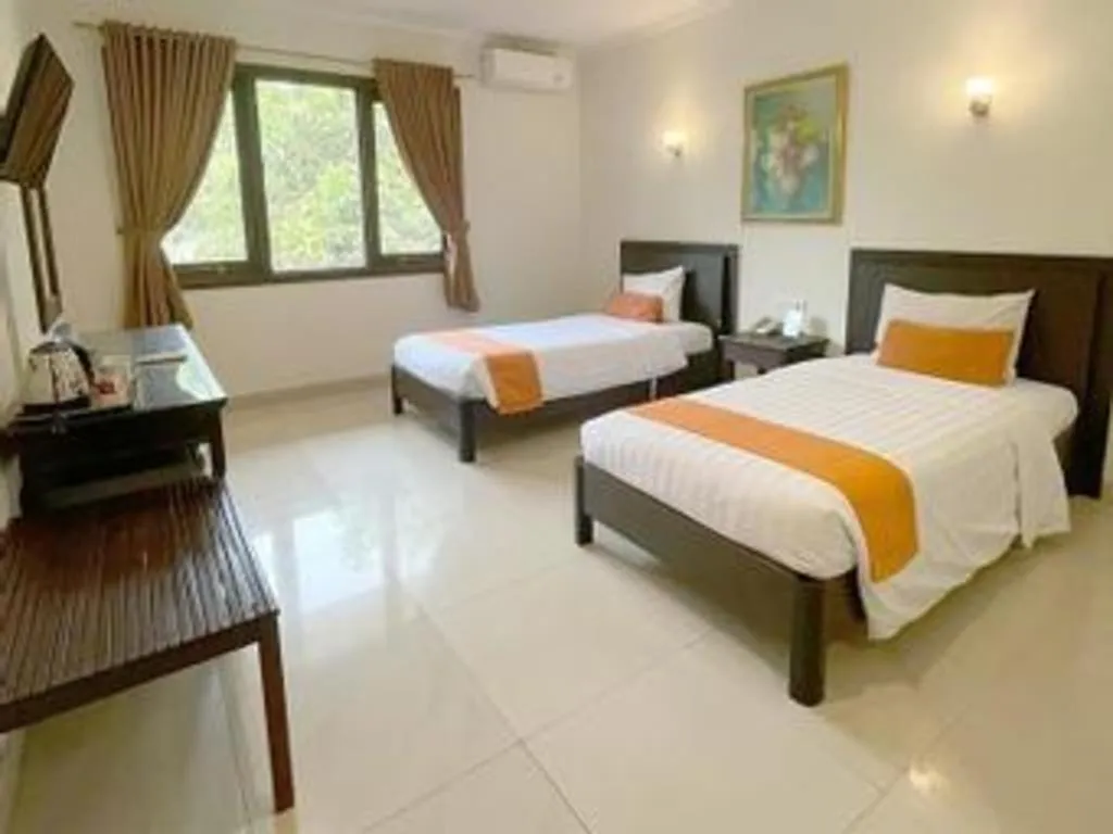 Bed in Ole Suite Hotel and Cottage