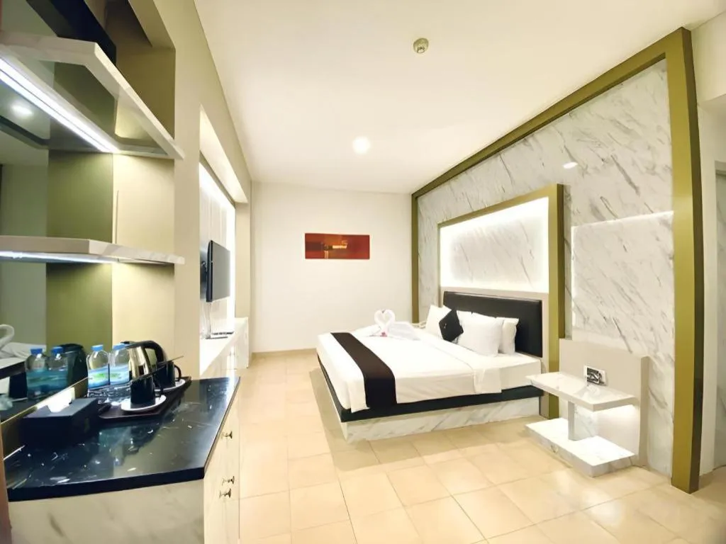 Bed in Grand Malioboro Yogyakarta