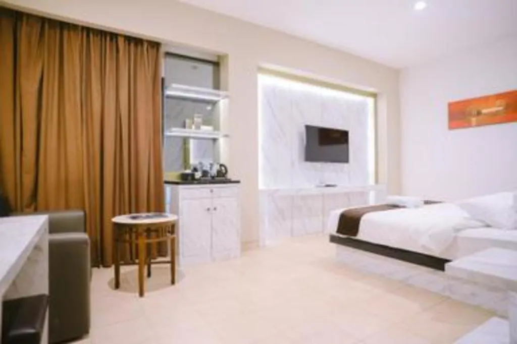 Bed in Grand Malioboro Yogyakarta